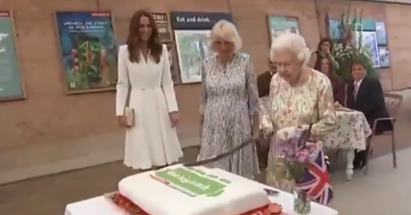 Watch Queen Elizabeth Cut Cake Using A Sword