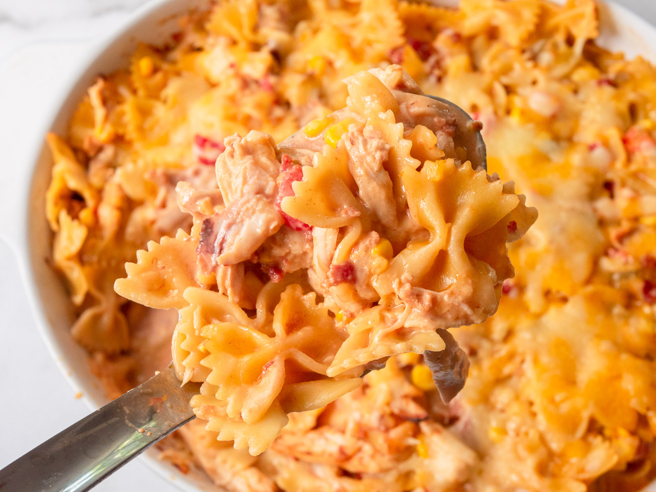 Close up of cheesy bowtie pasta casserole