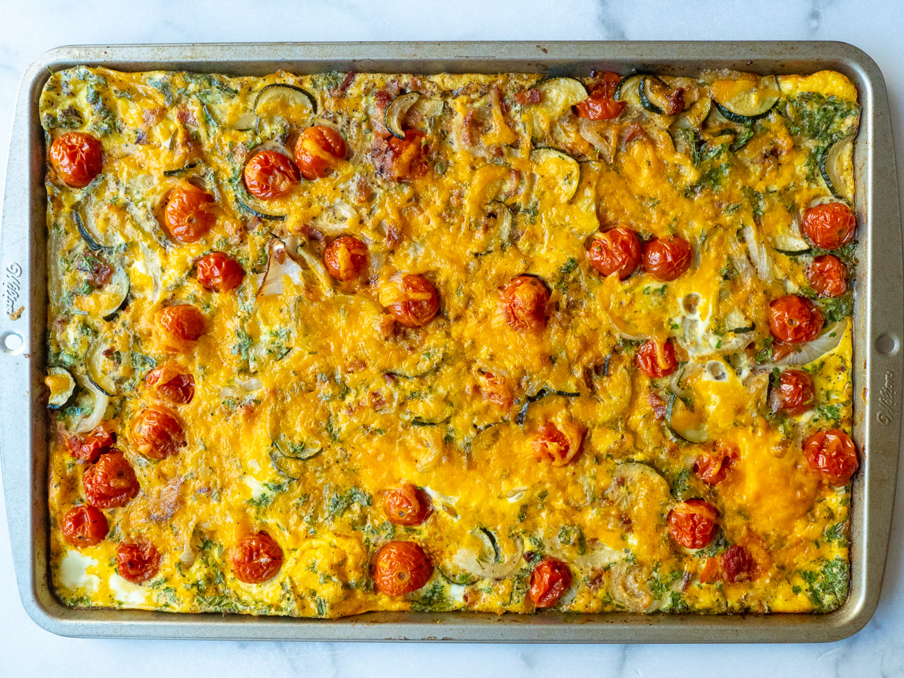 https://cdn.greatlifepublishing.net/wp-content/uploads/sites/2/2021/07/07151123/Sheet-Pan-Frittata-Horizontal-6.jpg