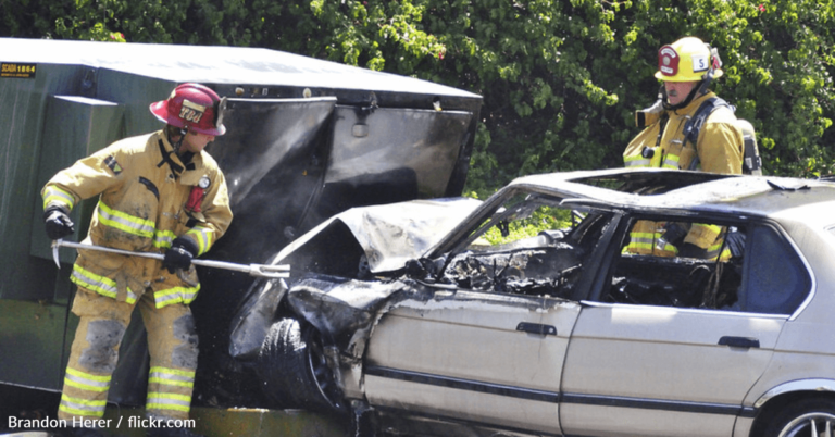 Firefighter Reads To Girl At Scene Of Car Accident