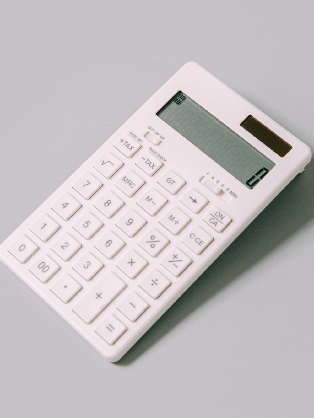 calculator on grey background