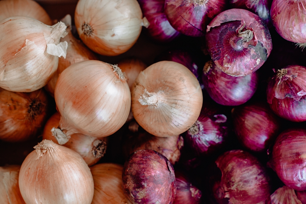 yellow and red onions with skins on