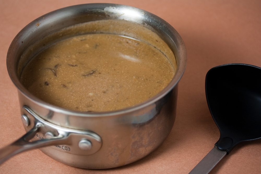 gravy in a metal pan