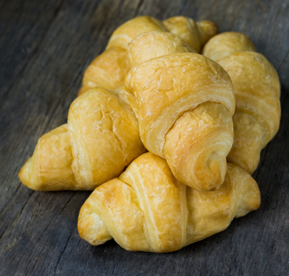 crescent rolls on wooden background