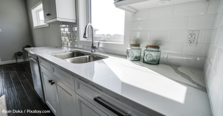 Woman Shares Hack To Clean Kitchen Tiles Using A Razorblade