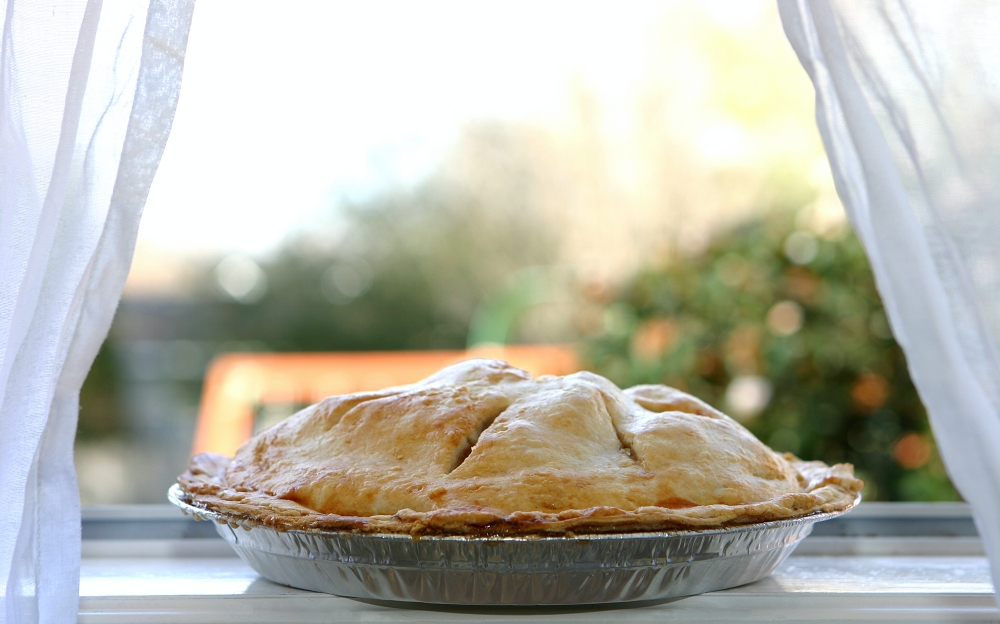 apple pie cooling on a windowsill