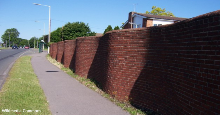How Wavy Walls Require Fewer Bricks Than Straight Walls