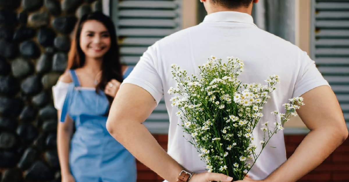 Man holding flowers