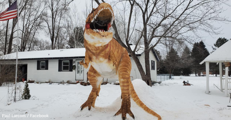 Man Sculpts A 12-Foot-Tall T-Rex Out Of Snow In His Yard
