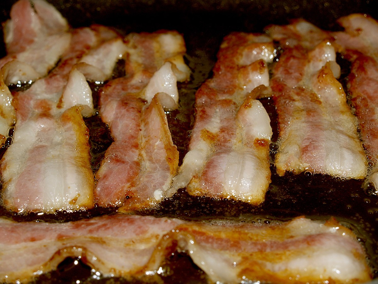 We've been cooking bacon all wrong Americans say it should be boiled in  water