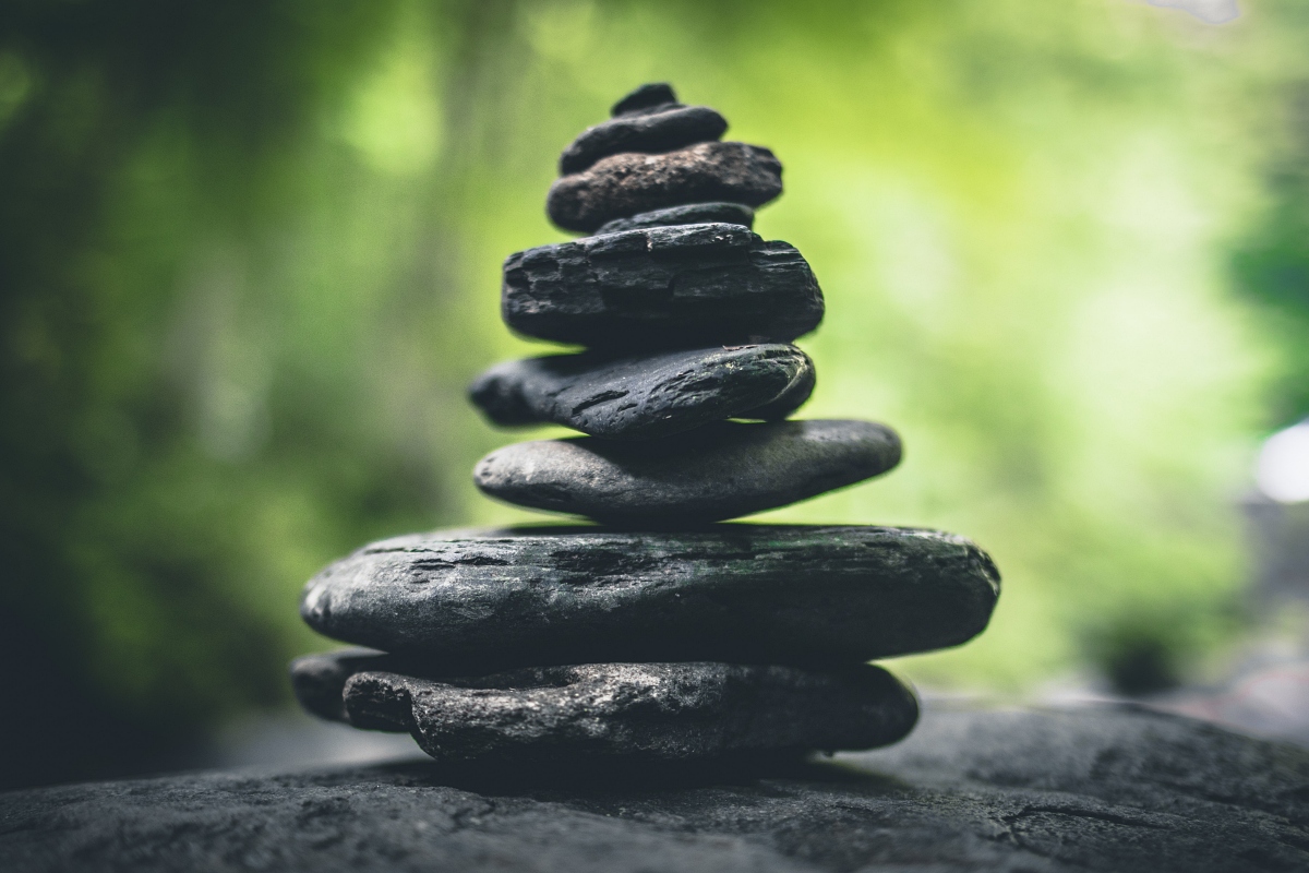 stacked stones on larger rock