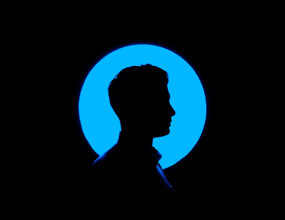 man with blue circle around his head