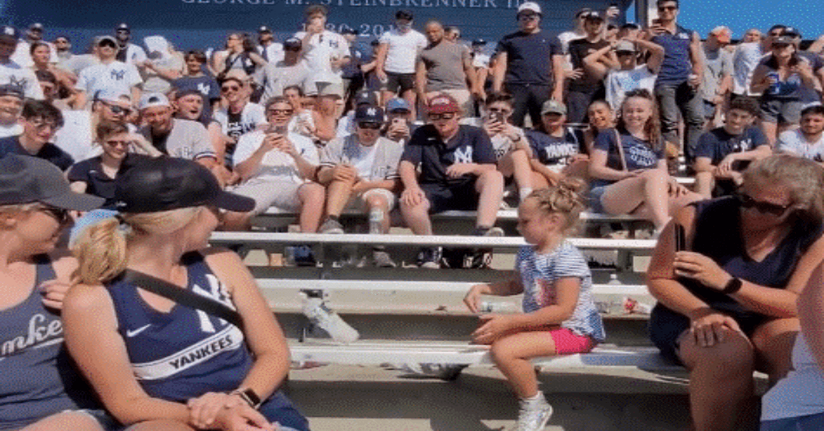 Yankees fans cheer on bottle flip challenge girl video