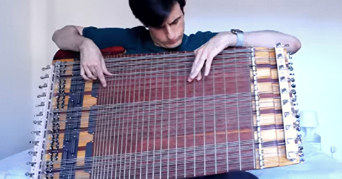 Musician Plays Solo On The Worlds Only 69 String Bass Guitar 12