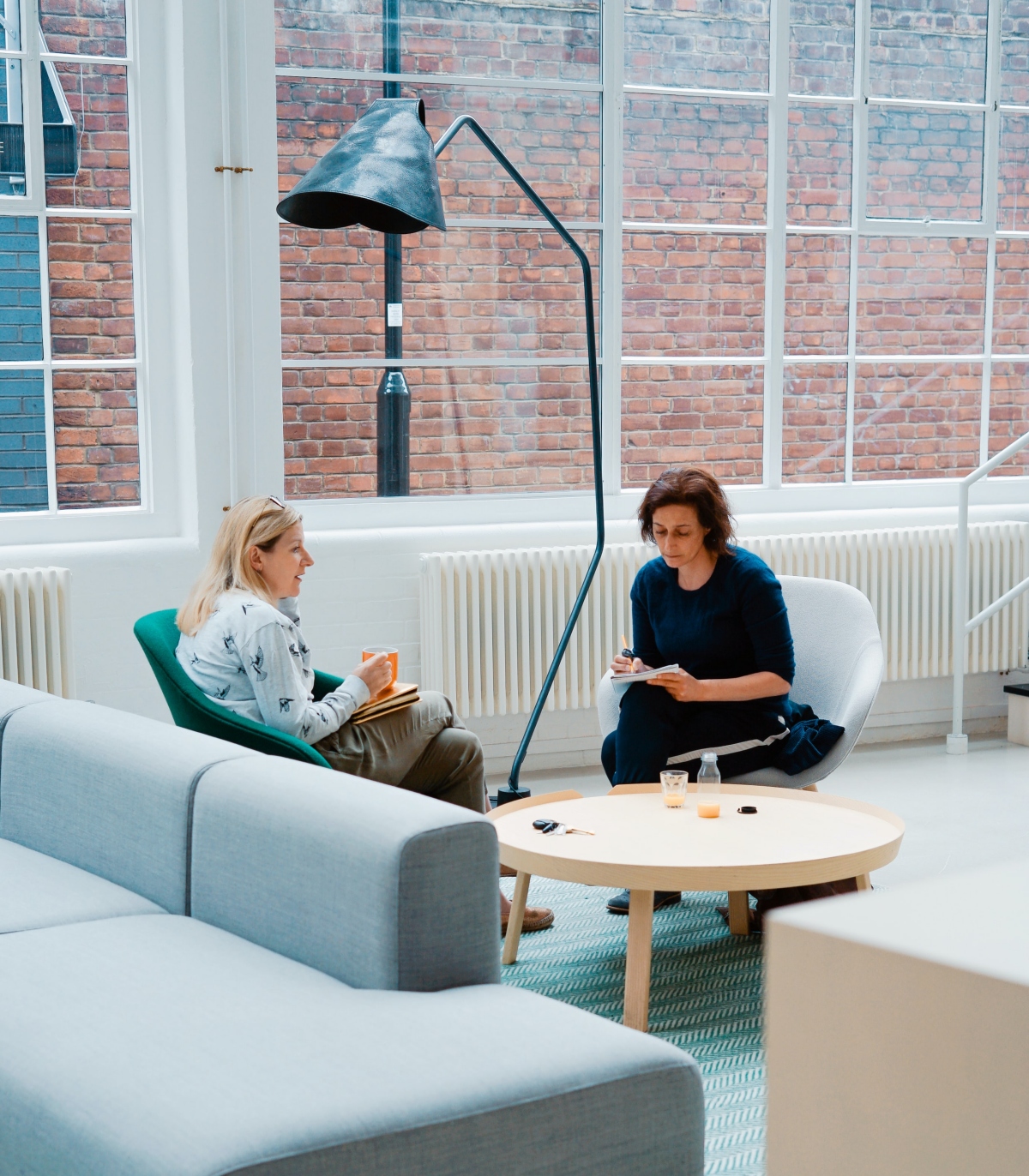 two women in a meeting