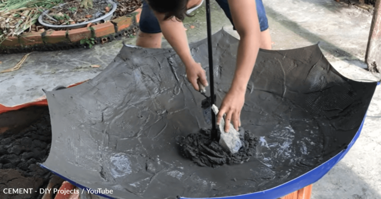 Man Uses Umbrella And Cement To Create DIY Fish Pond