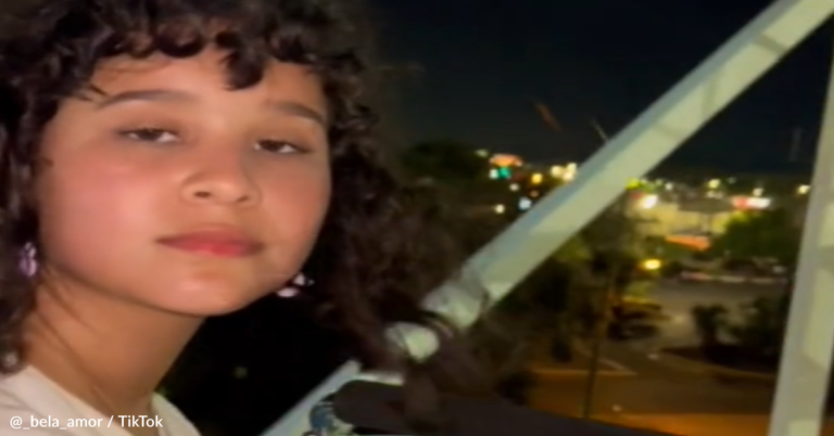 Woman Tries To Keep A Straight Face While Riding A Roller Coaster