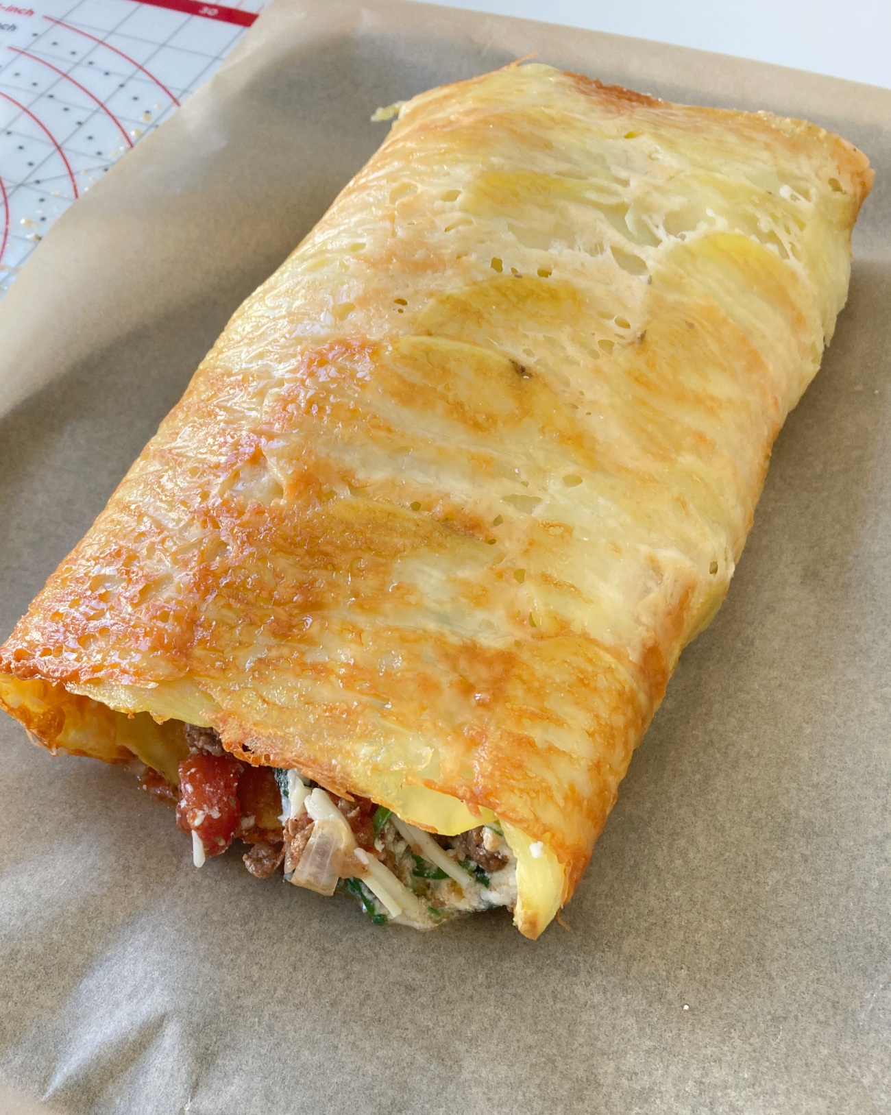 Place on lined baking sheet and bake for 15 minutes or until mozzarella is melted. Cut into slices to serve.