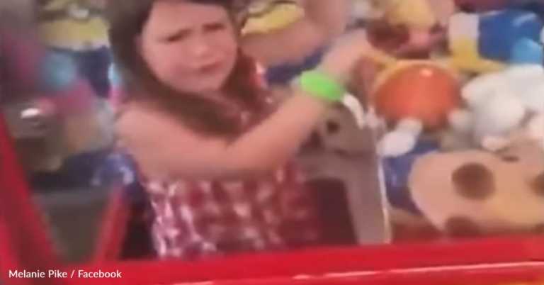 Girl Gets Trapped In Claw Machine Attempting To Steal A Teddy Bear