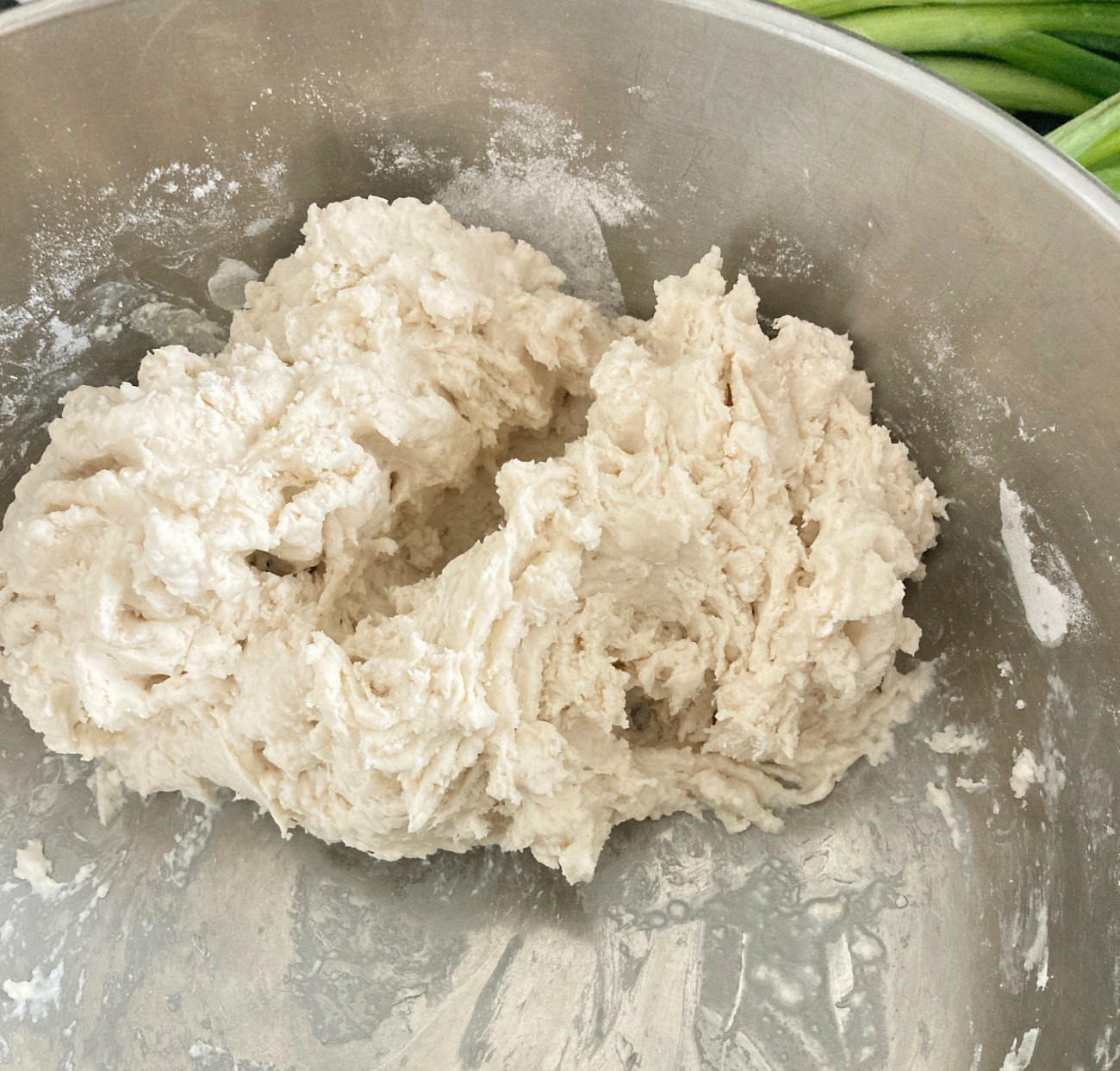 Combine flour and salt for dough in large mixing bowl. Using an electric mixer with dough hooks add hot water slowly while mixing. Then add cold water slowly. If dough is too dry add 1 teaspoon cool water and knead again. Repeat until ball forms, then chill in refrigerator for 20 minutes.