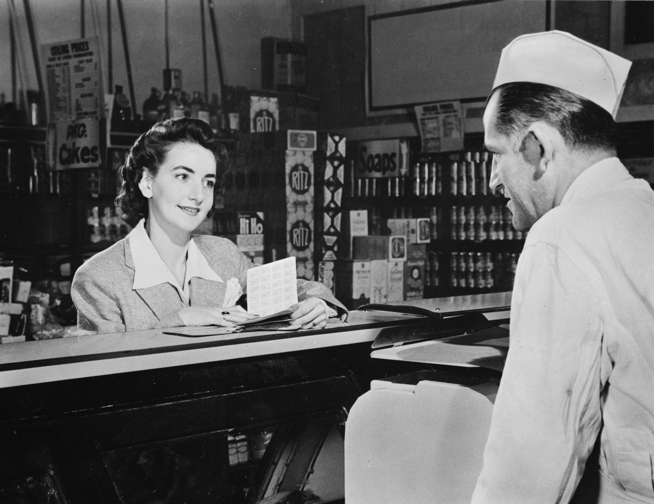 woman buying rationed foods in the 1940s