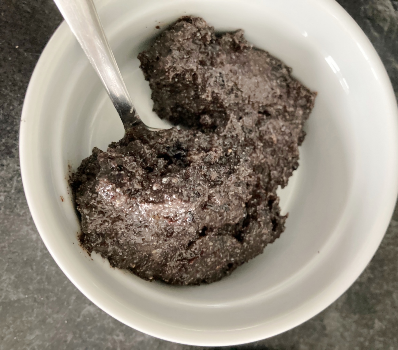 Grind poppy seeds in a spice grinder or clean coffee grinder. Pour into clean food processor along with along with maple syrup, butter, vanilla, salt, and raisins. Pulse until smooth mixture forms.