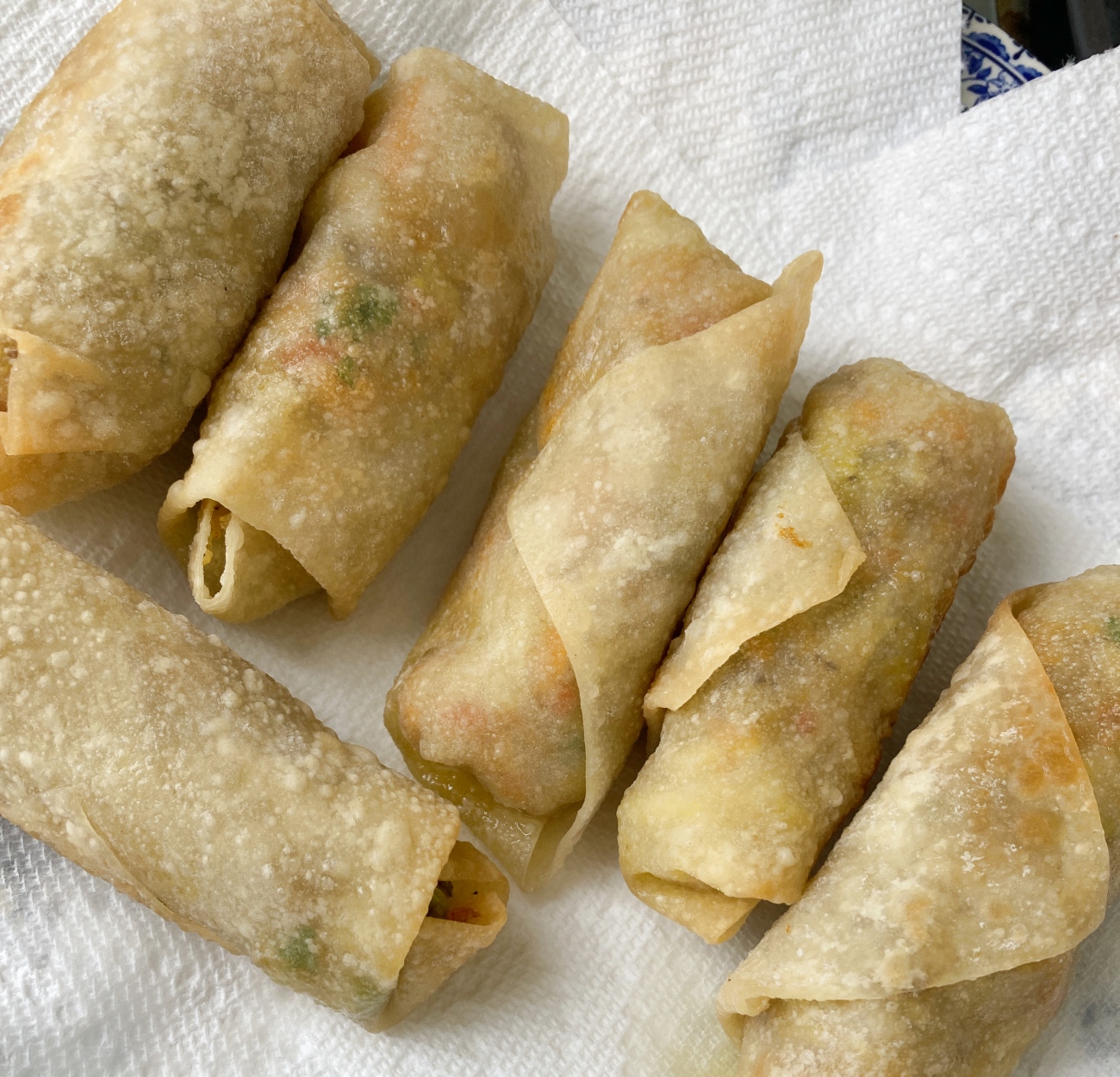 Place lumpia on paper towel-lined baking sheet to drain and cool. Serve with sauce on the side for dipping.