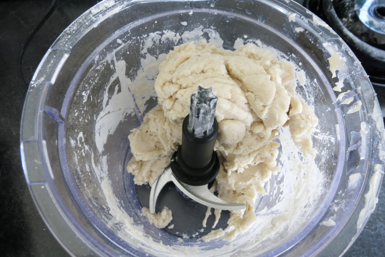 Preheat oven to 440˚F. Combine flour, salt, baking powder, and butter in food processor. Add 1 tablespoon of cold water at a time until dough just begins to form. Place in bowl and cover with plastic wrap. Refrigerate for 30 minutes.