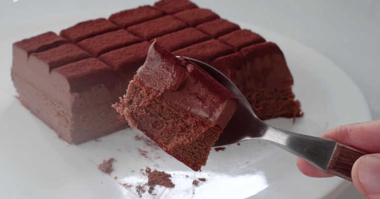 Chocolate, Eggs, And Cream Are The Simple Dream Team For Making This Double Fudge Cake