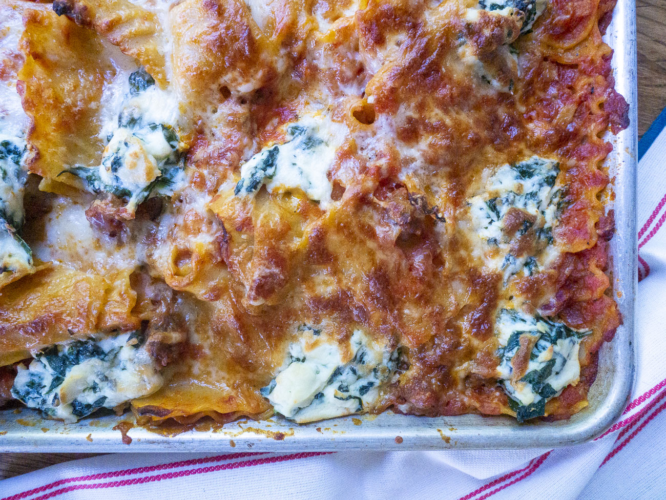 https://cdn.greatlifepublishing.net/wp-content/uploads/sites/2/2023/05/10123420/Giadas-Crispy-Sheet-Pan-Lasagna-Horizonatal_15.jpg