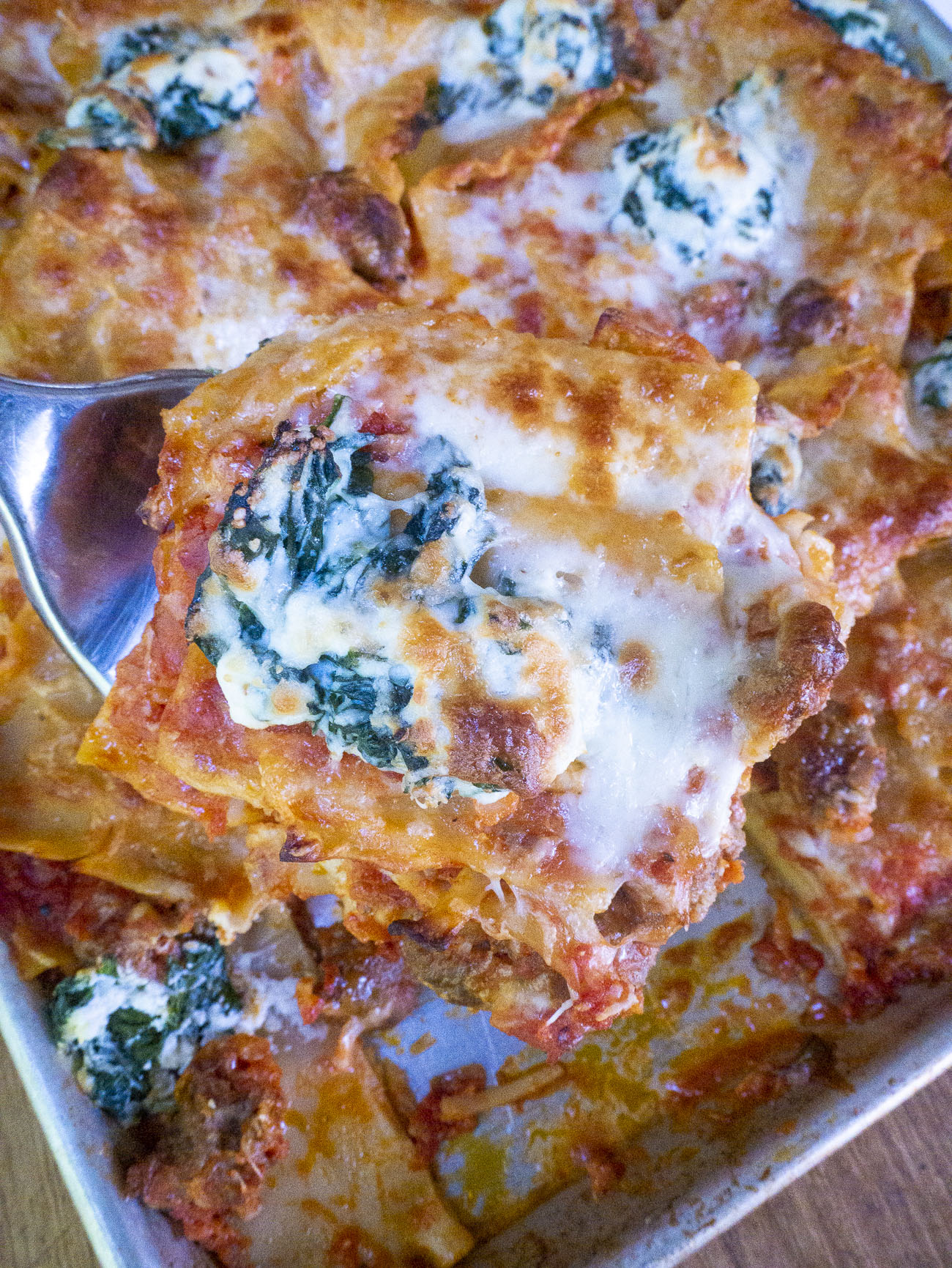 https://cdn.greatlifepublishing.net/wp-content/uploads/sites/2/2023/05/10123835/Giadas-Crispy-Sheet-Pan-Lasagna-Vertical_23.jpg