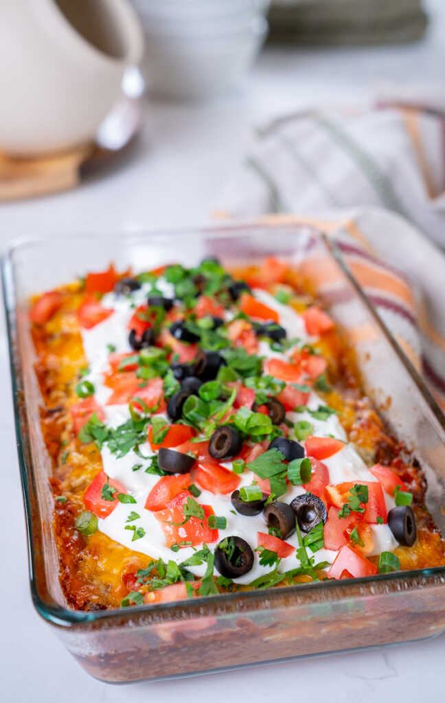 Baked Mexican Layer Dip | 12 Tomatoes