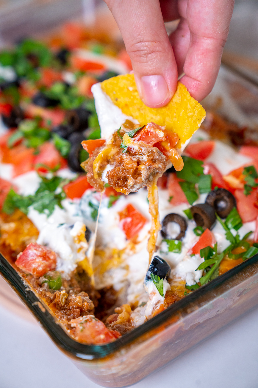 Baked Mexican Layer Dip | 12 Tomatoes