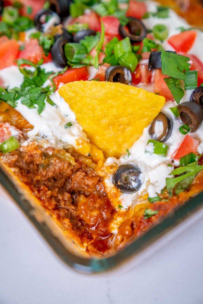 Baked Mexican Layer Dip | 12 Tomatoes