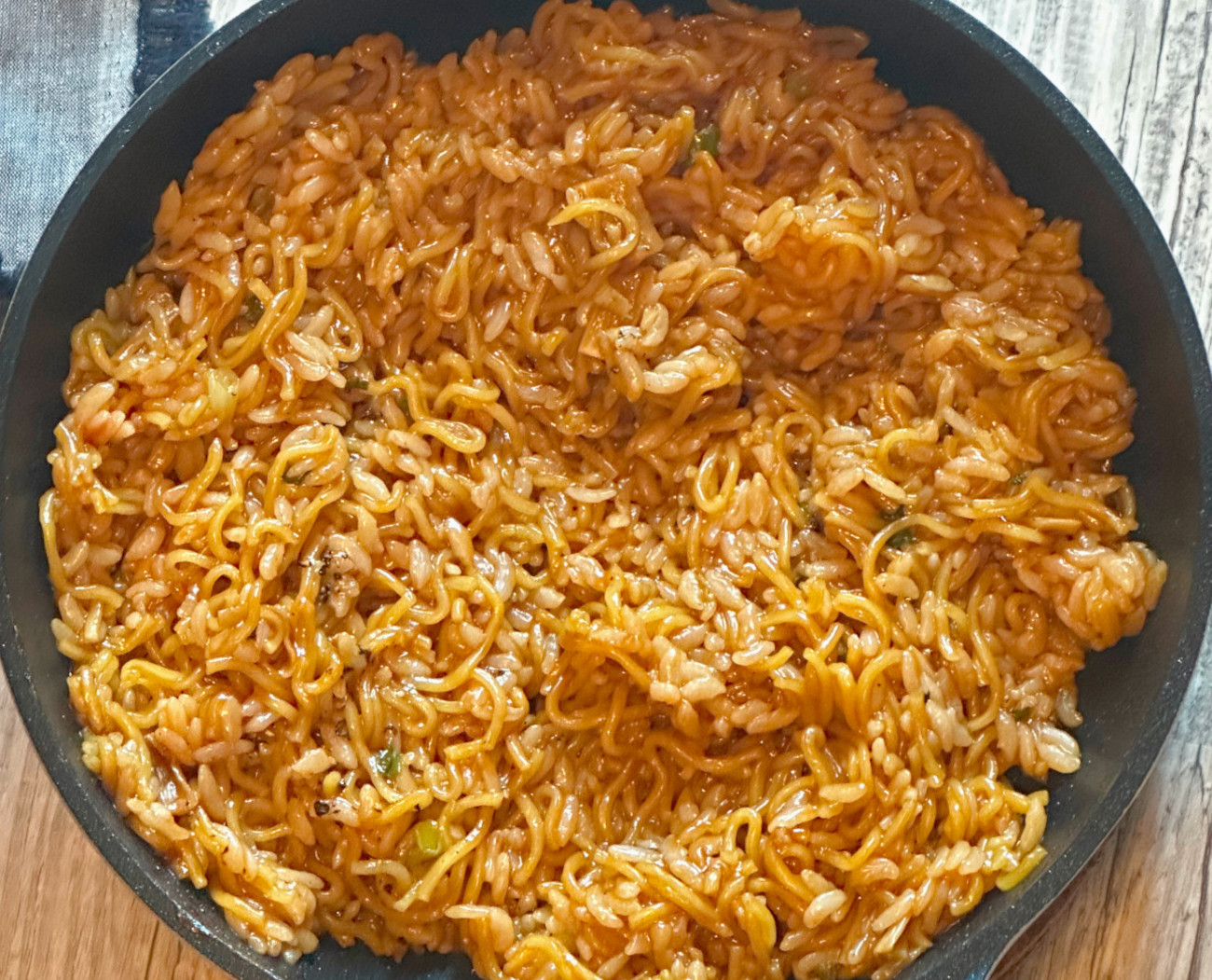 https://cdn.greatlifepublishing.net/wp-content/uploads/sites/2/2023/06/25182115/Instant-Ramen-Fried-Rice-Horizontal_04.jpg