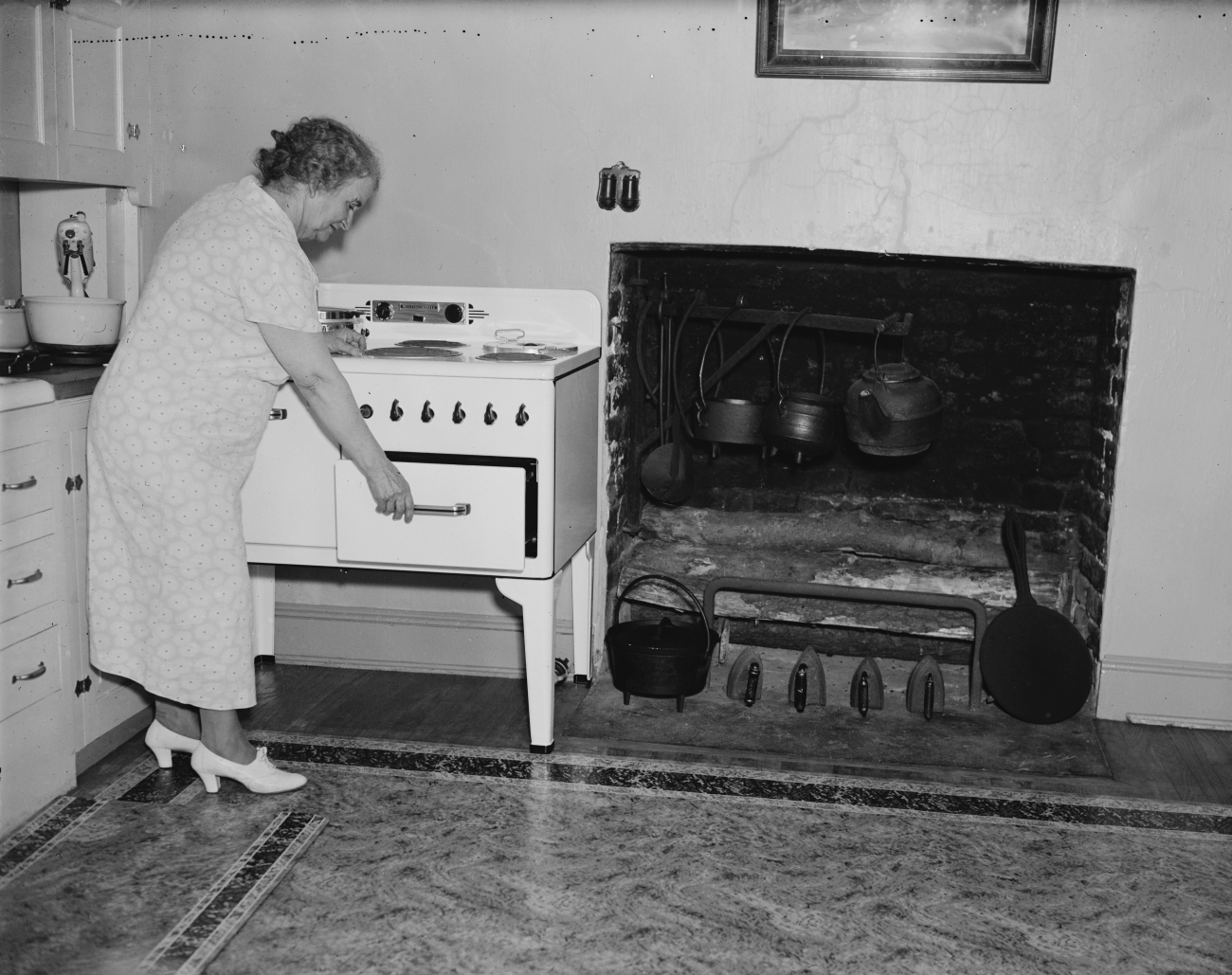 Woman Cooking on Stove Near Hearth