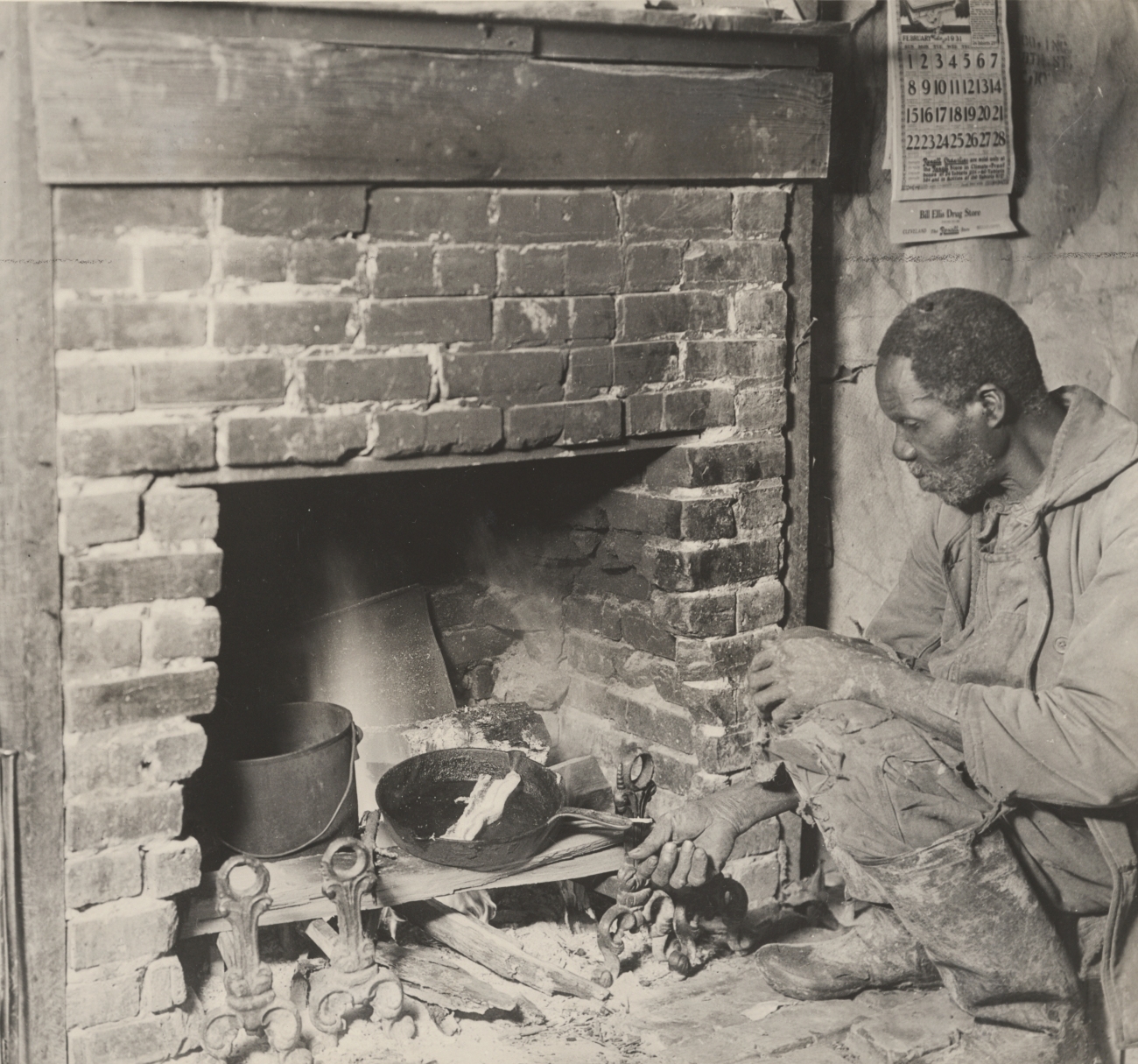 Man Cooking Bacon on Cast Iron Over Open Hearth 1930s