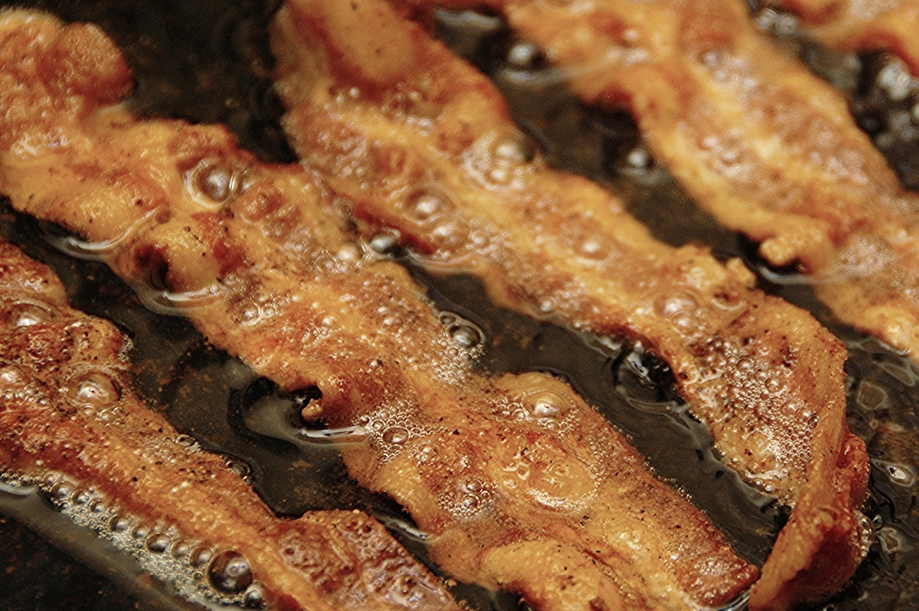 Bacon Frying in Cast Iron Skillet