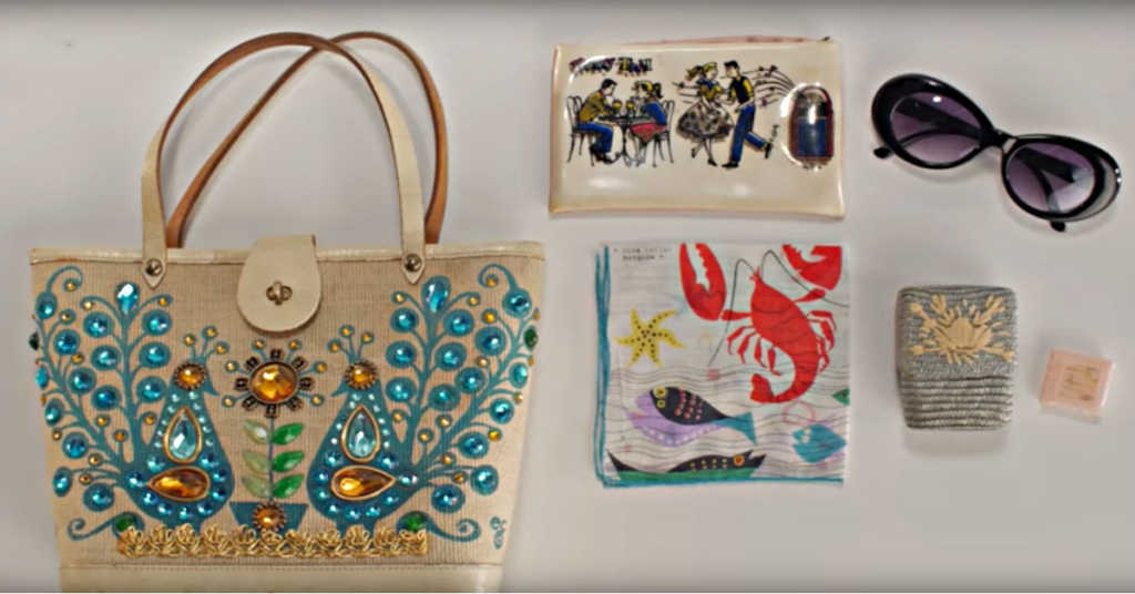 This 100 years of handbags vid shows what we carried in our purses