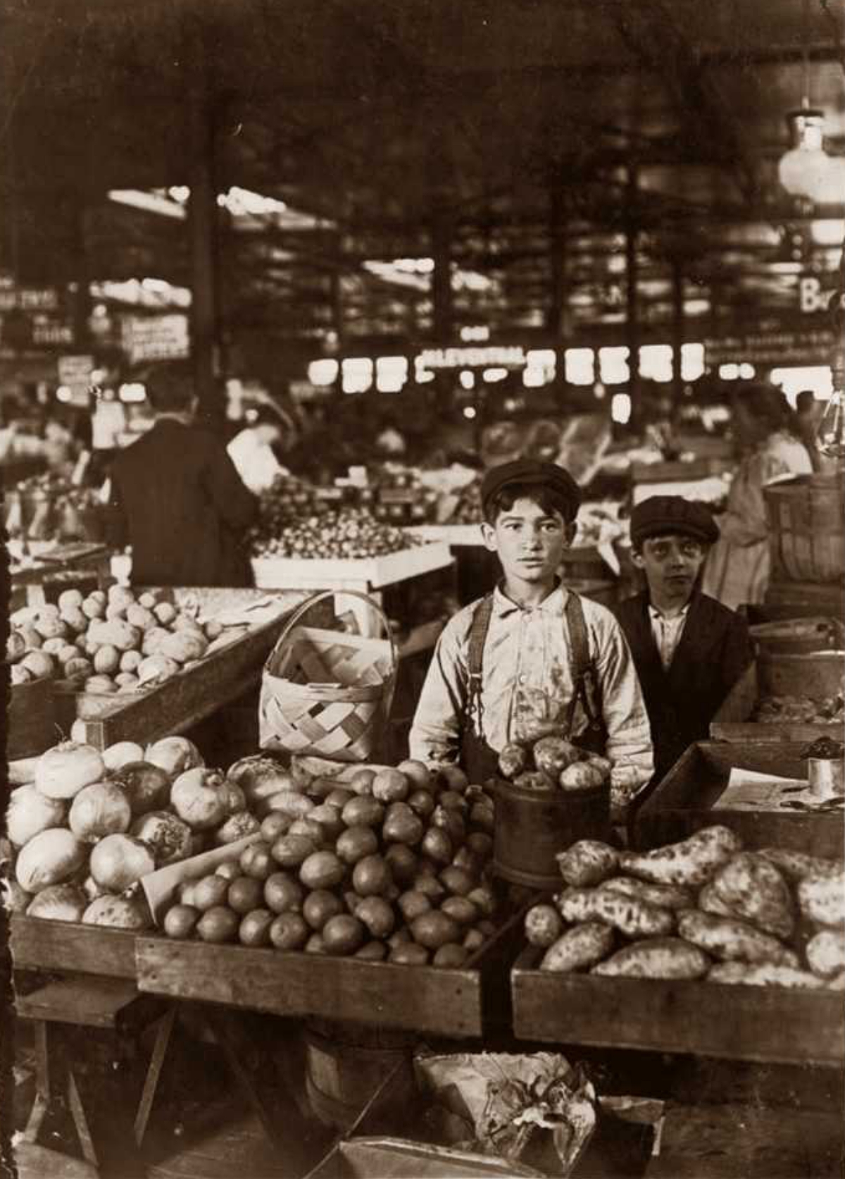 young boys working in a grocery at the turn of the 20th century