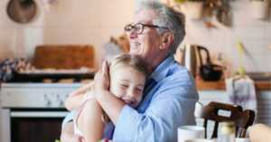 grandparent hugging grandchild
