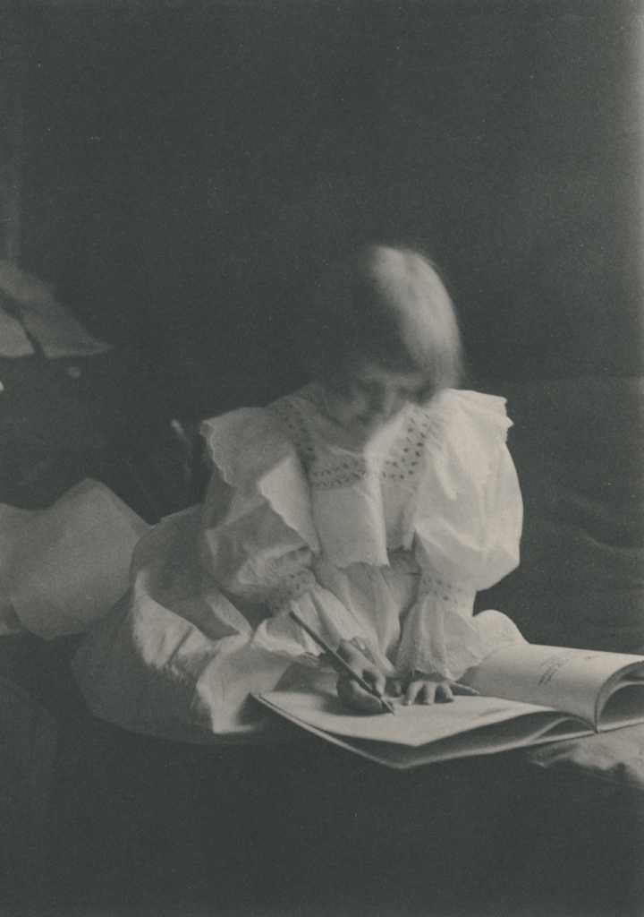 young girl writing, 1898