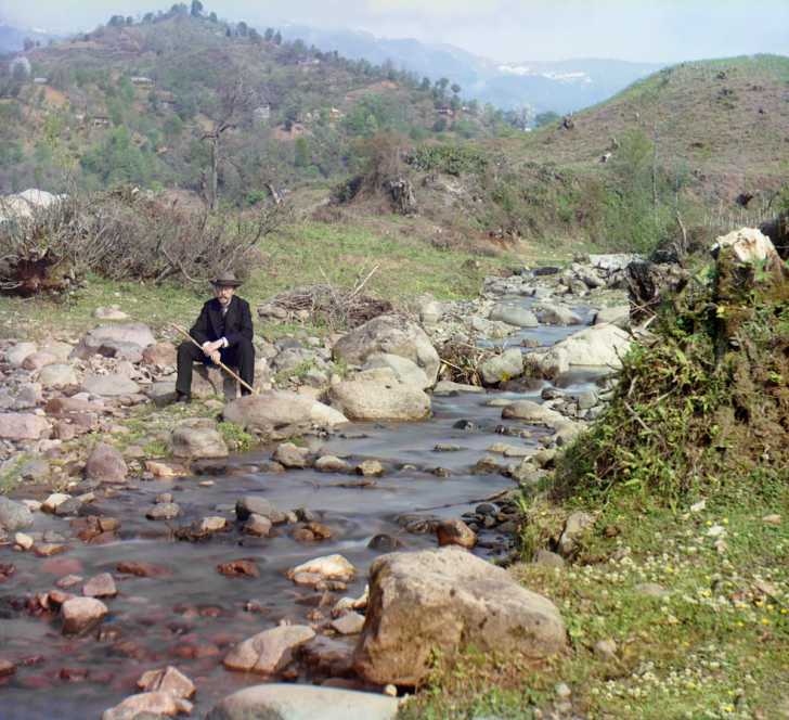 Self portrait of Prokudin-Gorskiĭ sitting on the banks of the Skuritskhali River, Orto-Batum village near Batumi, Georgia