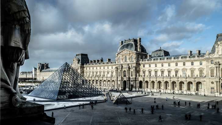 the Louvre on a cloudy day