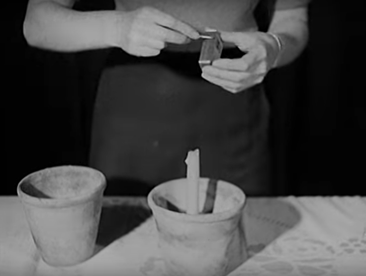 a makeshift candle heater for use during WWII