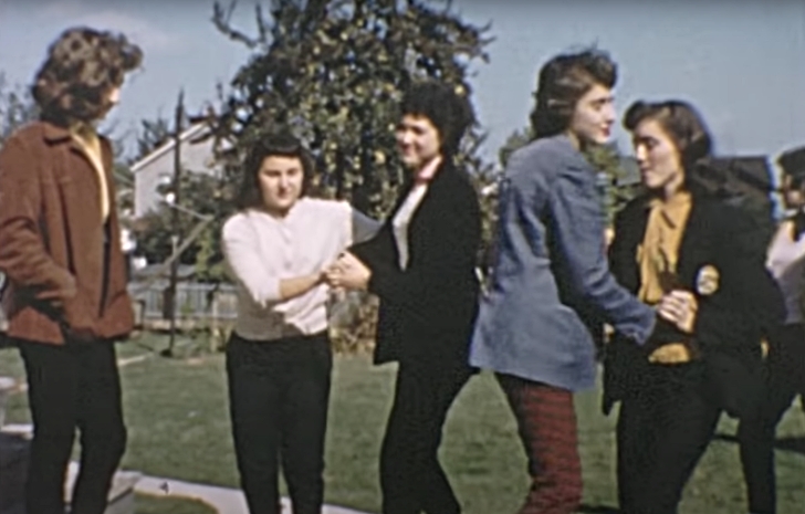 women partner dancing outside, 1950s