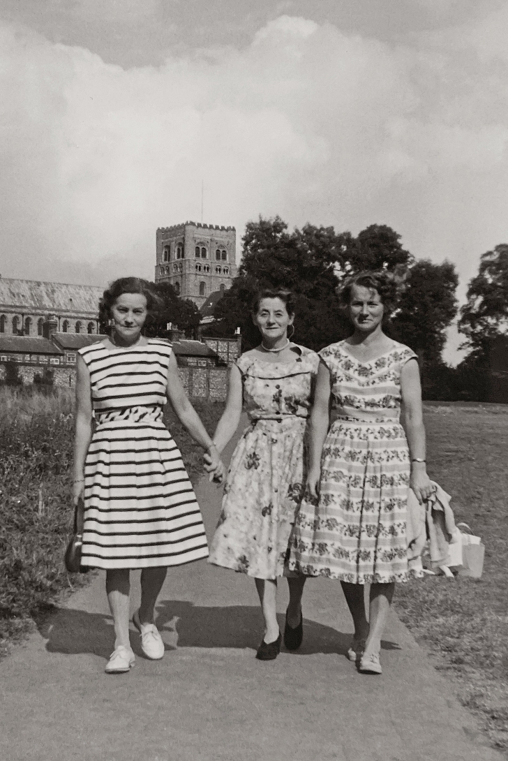 women walking holding hands 1950s