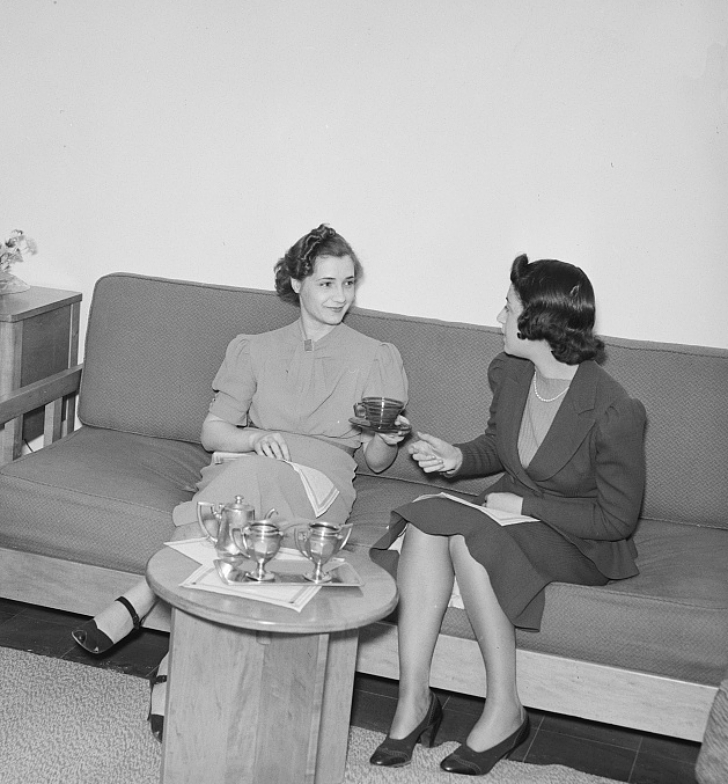 two women having tea together, late 1930s