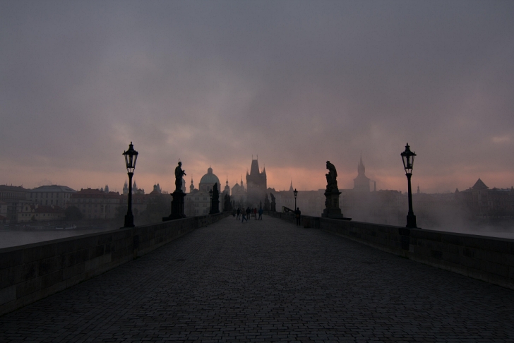 Charles Bridge in Prague covered in fog