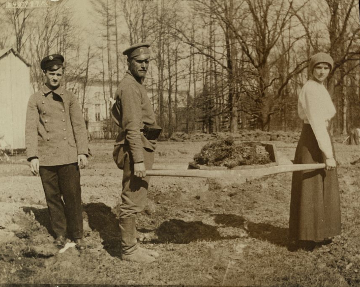 Grand Duchess Tatiana gardening at the palace under guard